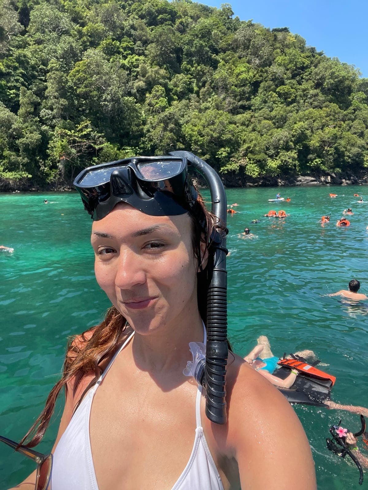 Katarina with a snorkel mask in turquoise water